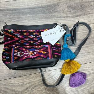 Kyrie and Co Genuine Leather embroidered purse with poms